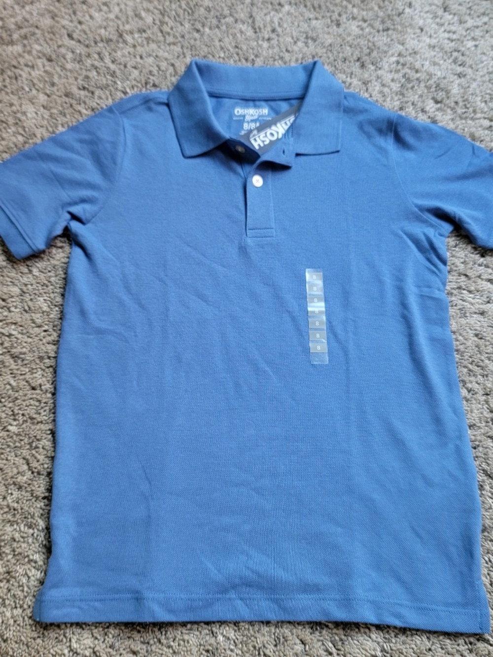 Oshkosh boys blue polo in size 8 NWT!